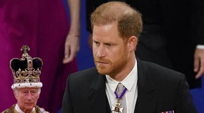 Prince Harry appears lost in thought, as no charm visible, after King Charles snub