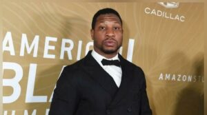 Jonathan Majors gets emotional after earning Perseverance Award at Unlocked Impact Awards