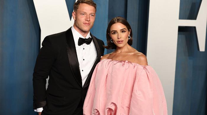 Olivia Culpo, Christian McCaffrey get in air to 'begin' wedding