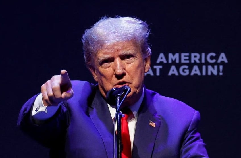 former u s president donald trump delivers remarks on education as he holds a campaign rally with supporters in davenport iowa u s march 13 2023 reuters jonathan ernst