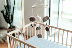 Why Every Nursery Needs a Baby Cot Mobile: Benefits and Tips for Choosing the Best One